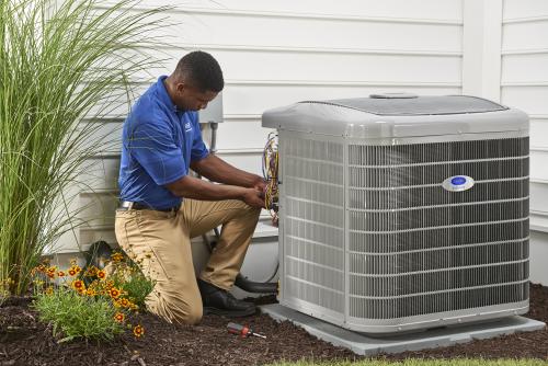 Carrier Dealer servicing air conditioner