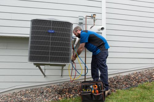 repairman checking gauges